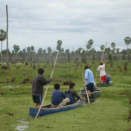 Local people searching the wetlands for yellow anacondas. Credit: Mariano Barros