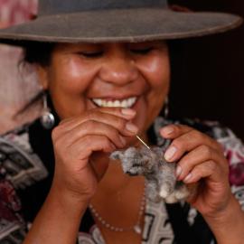 Chilean artisan working on a felted Andean cat Credit: Nicolás Lagos, AGA