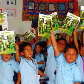 Environmental education at  school, using a colouring book made with the help of Defenders of Wildlife México. Credit: Claudia Cinta