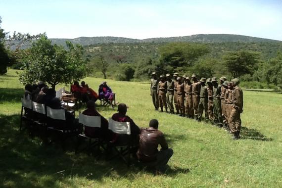 Community guards standing in front of community.